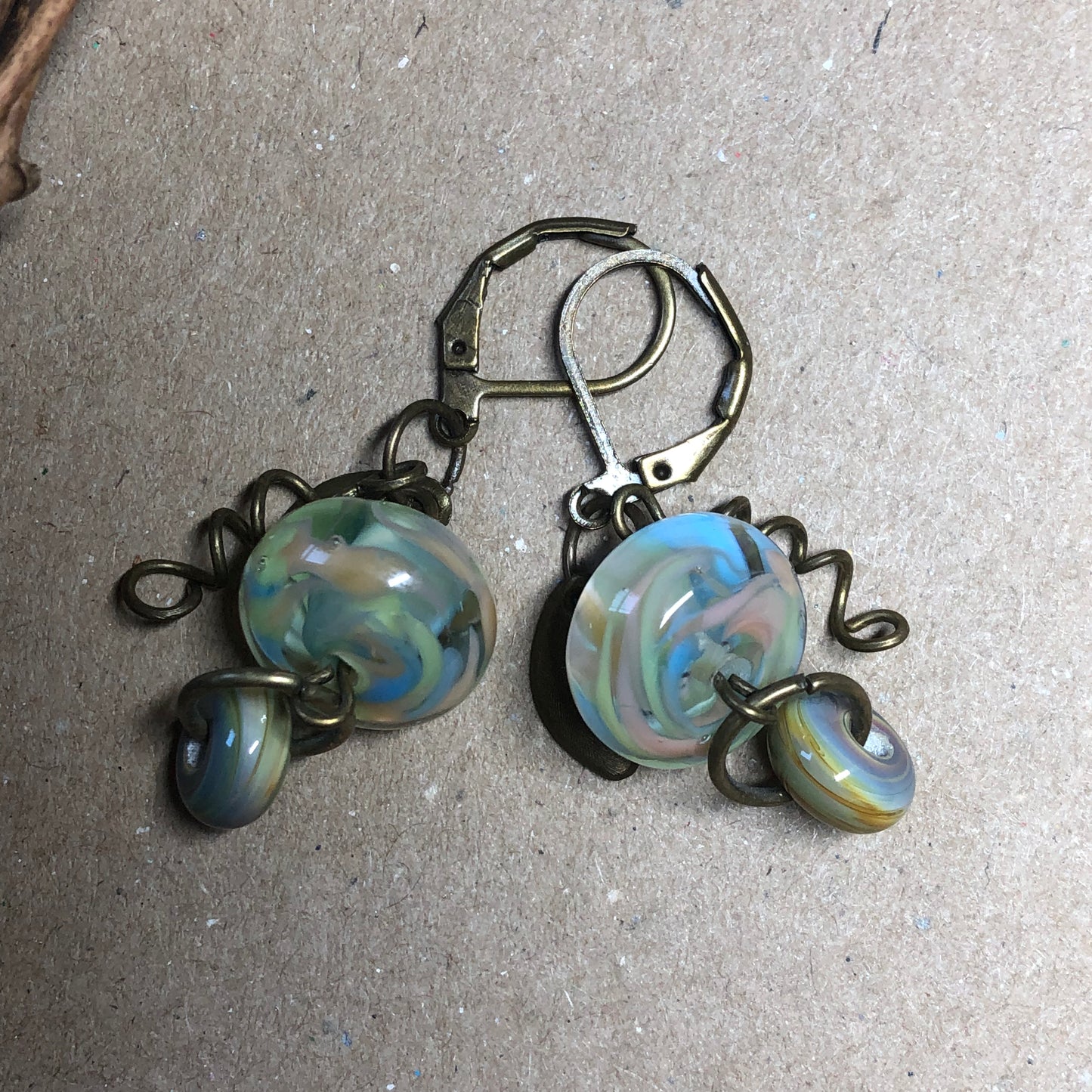 Green stripe lampwork bead earrings