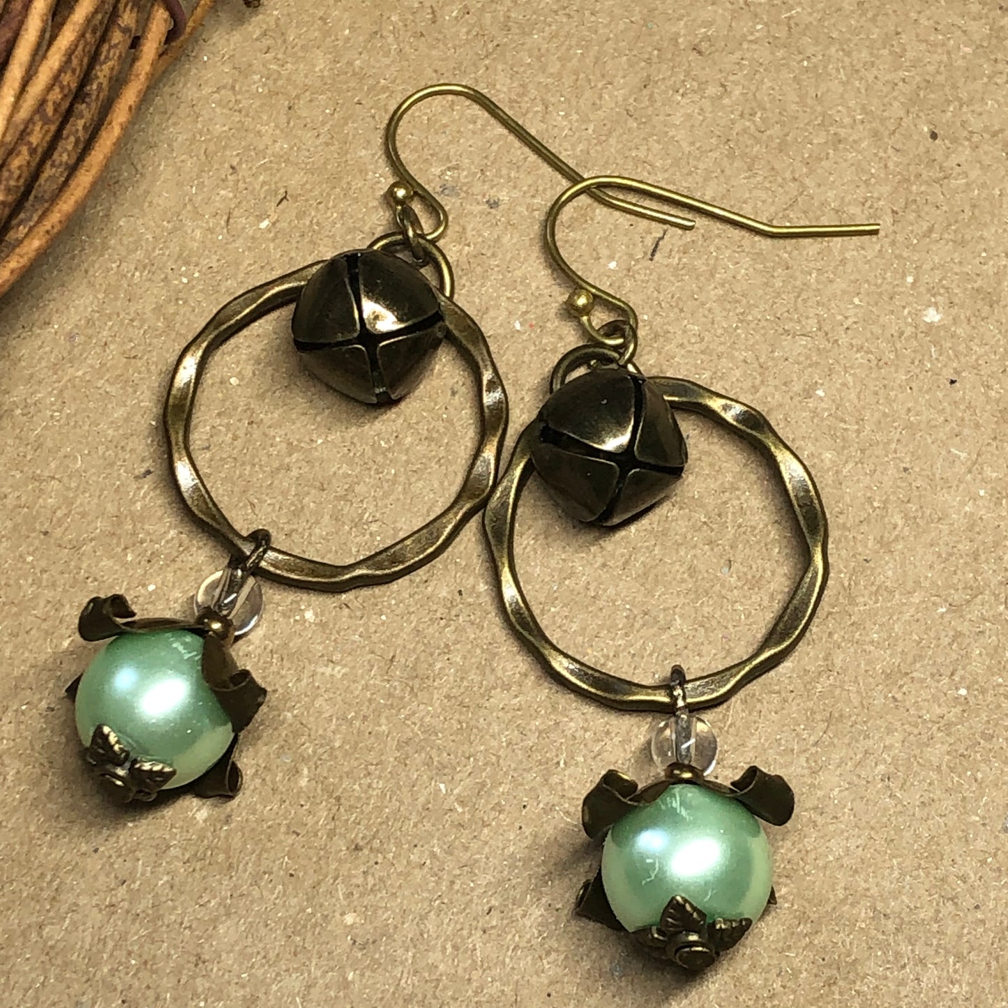 Green glass pearl bell hoop earrings