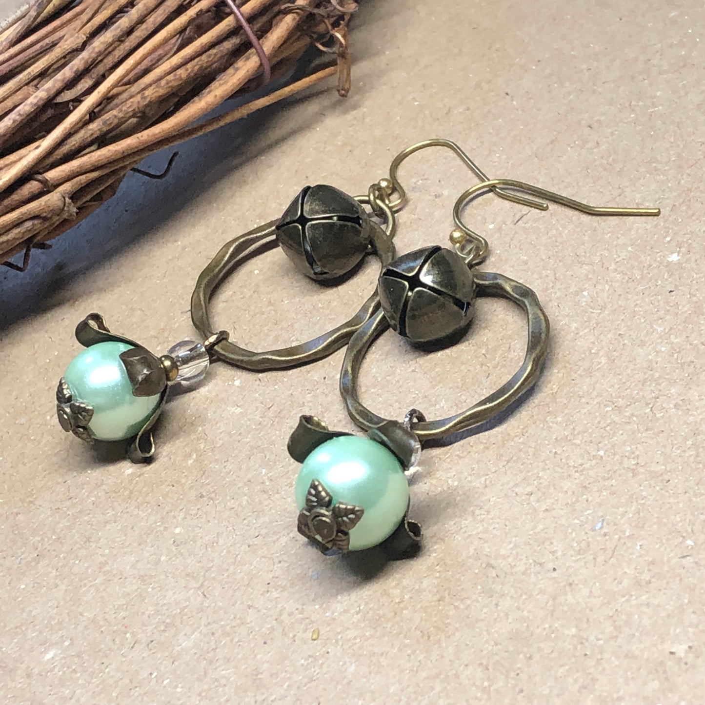 Green glass pearl bell hoop earrings