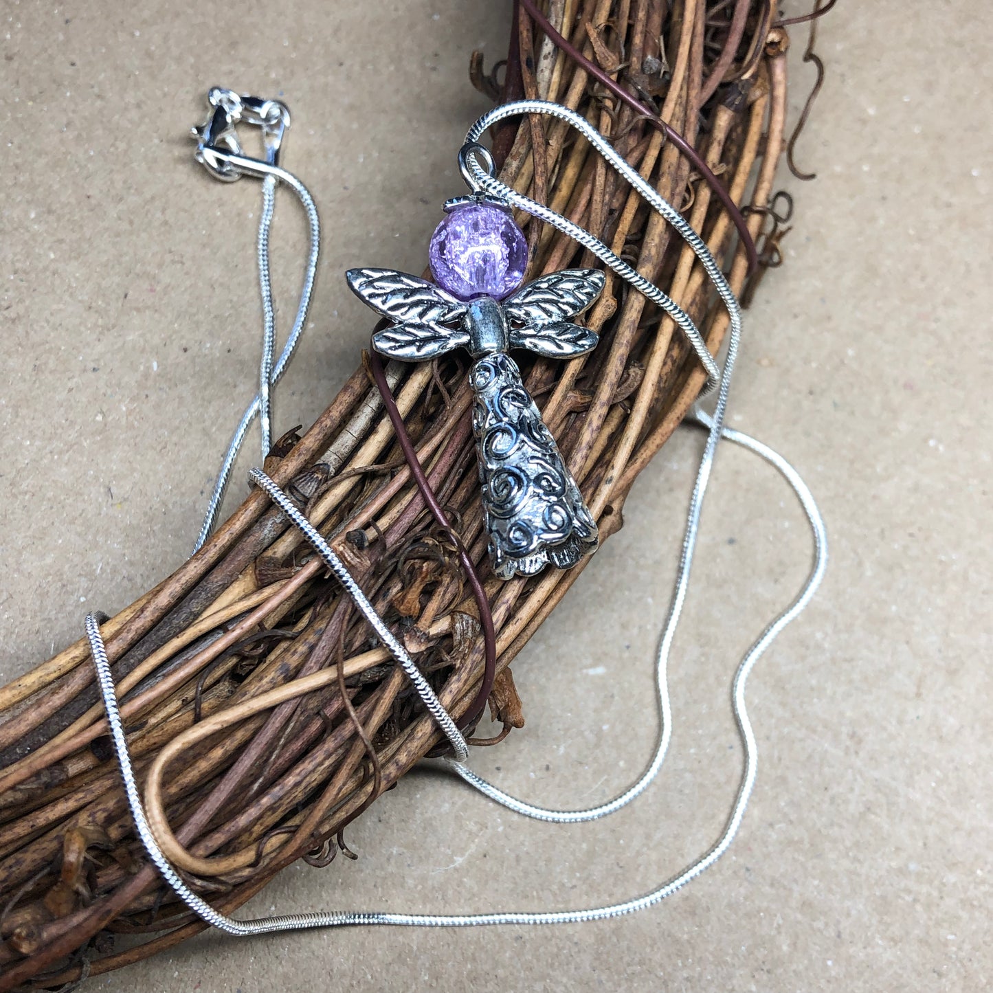 Angel and purple crackle glass silver necklace