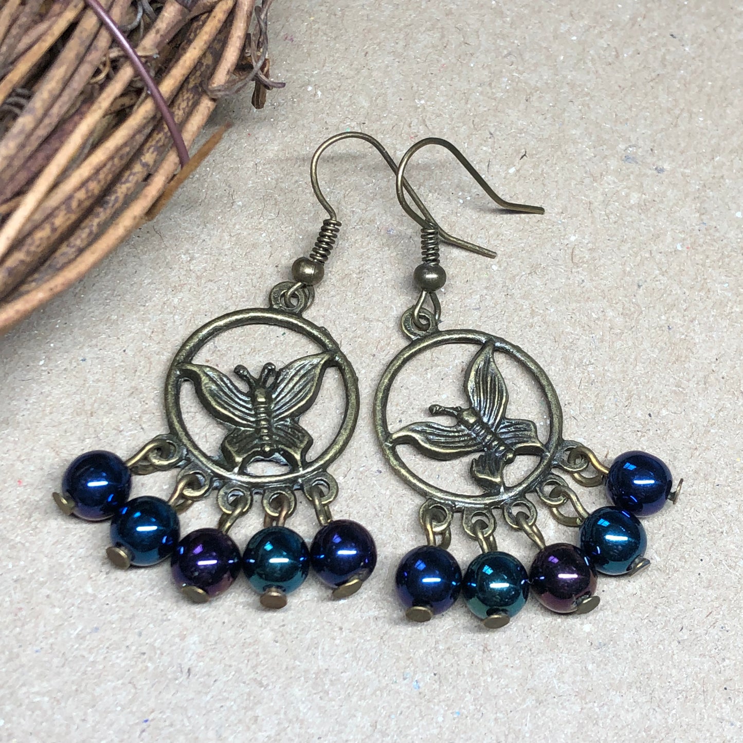 Midnight moth glass hoop charm earrings