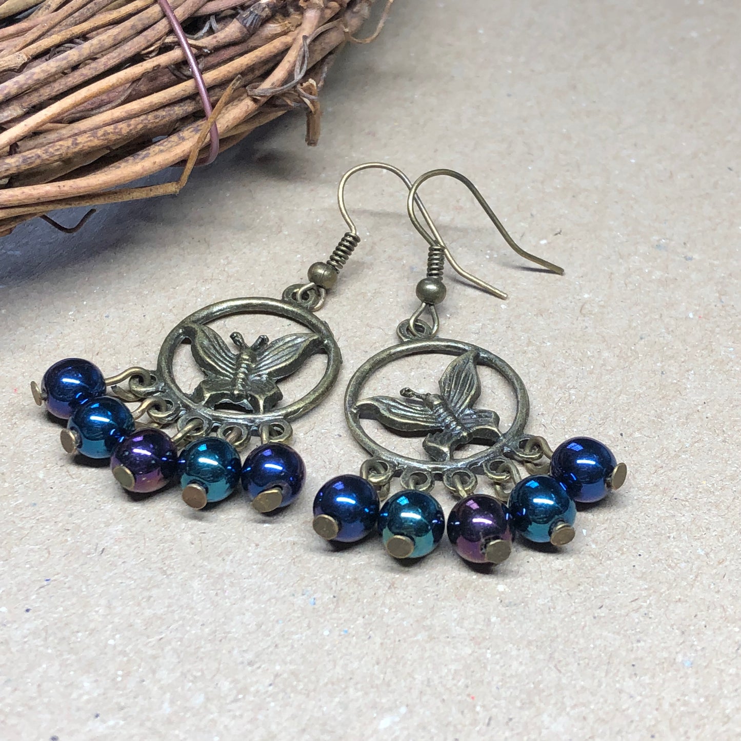 Midnight moth glass hoop charm earrings