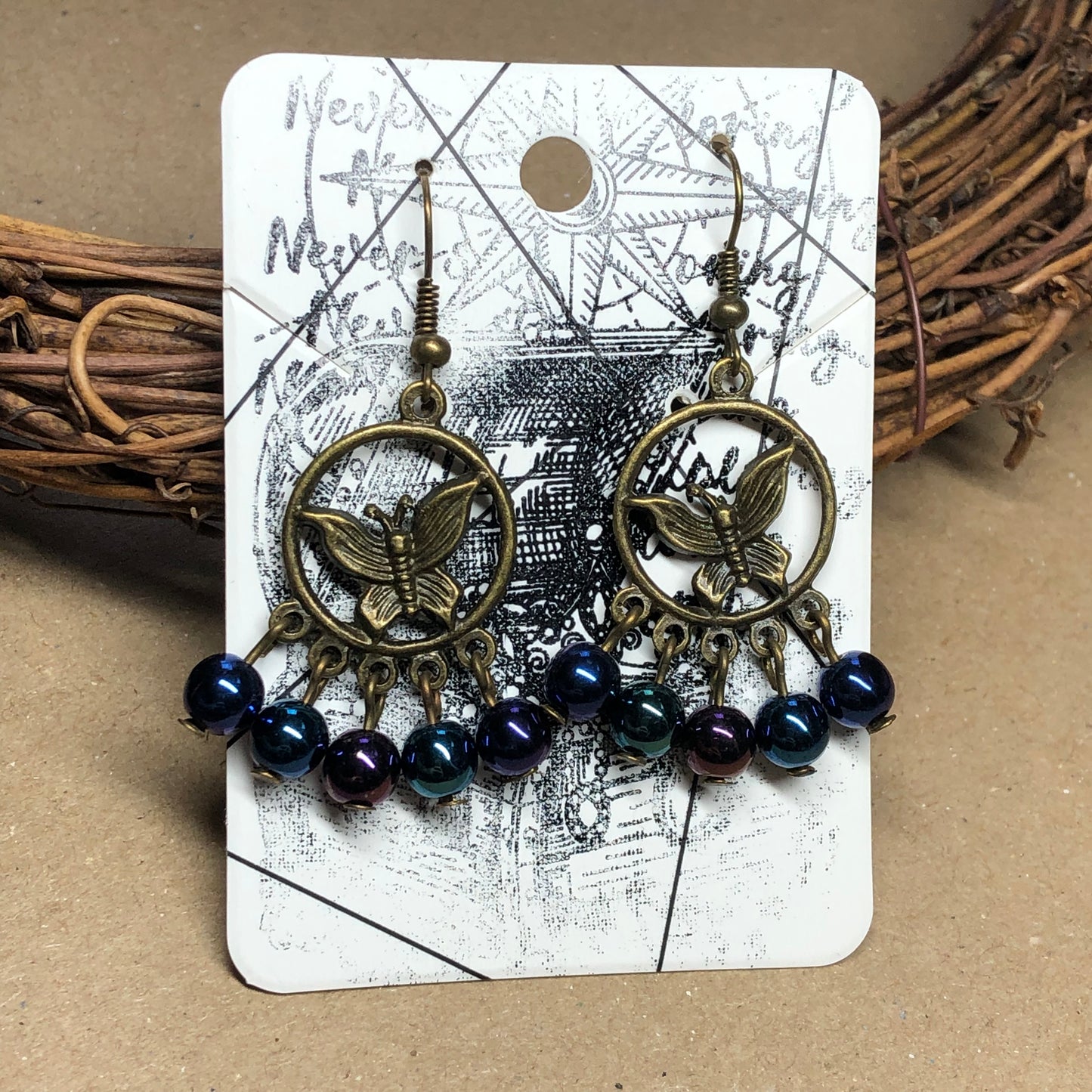 Midnight moth glass hoop charm earrings