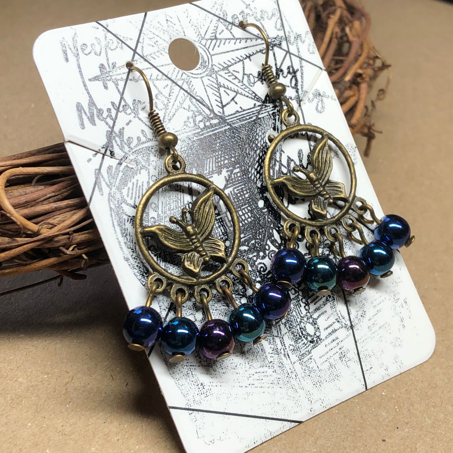 Midnight moth glass hoop charm earrings