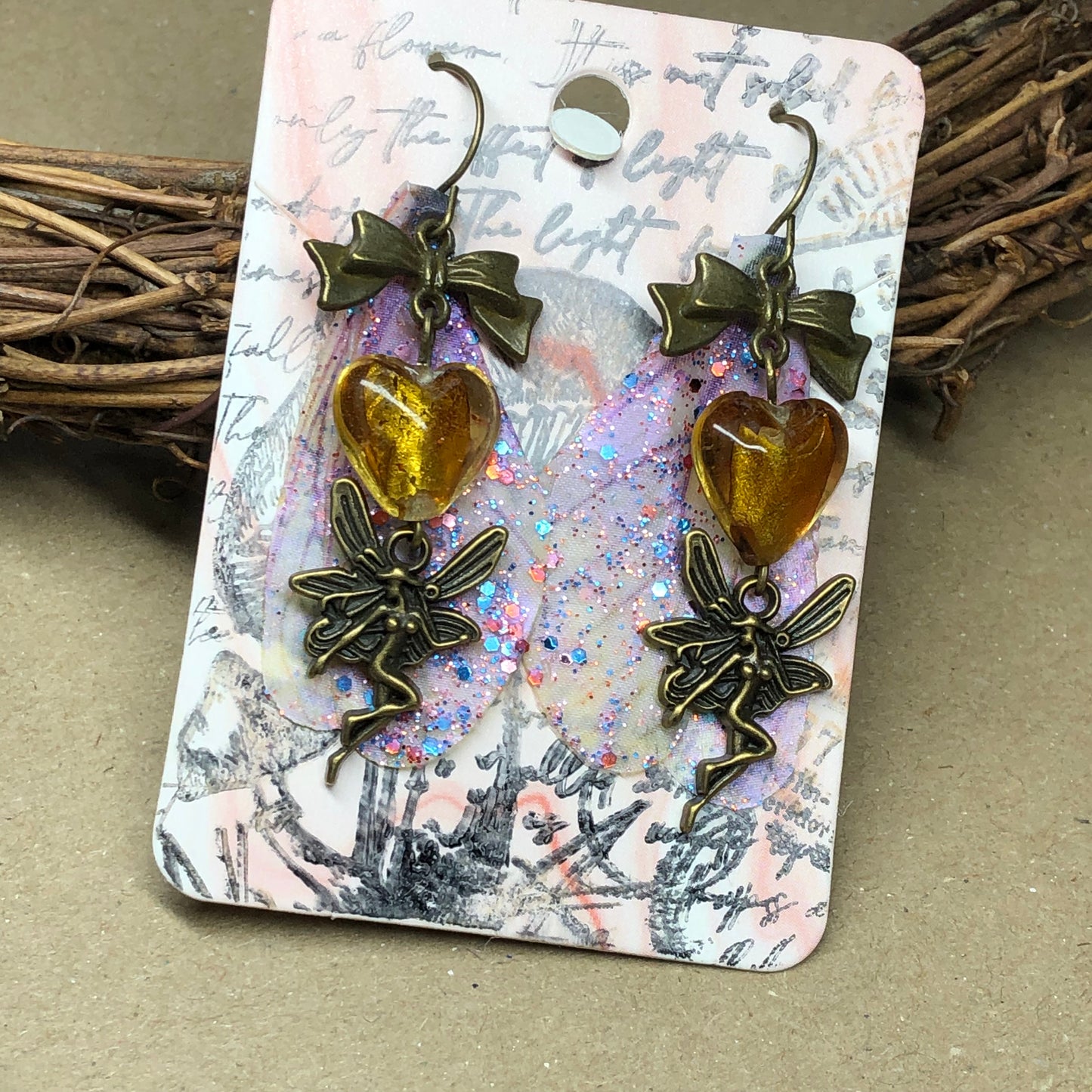 Murano glass heart fairy earrings