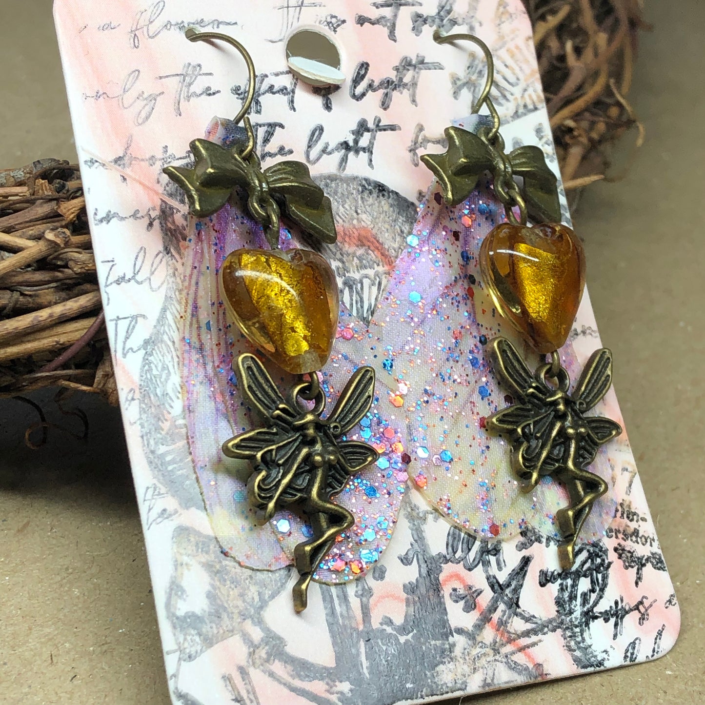 Murano glass heart fairy earrings