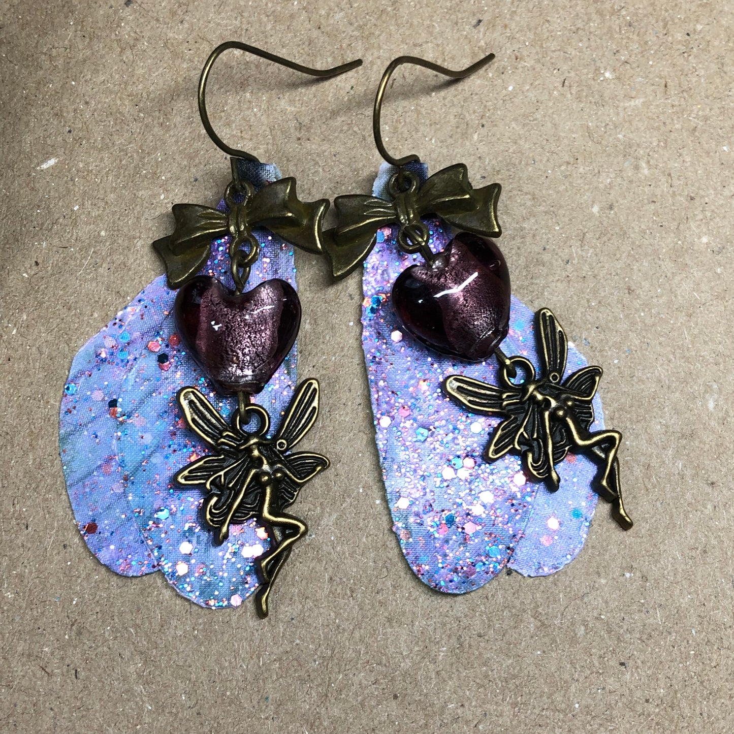 Bronze fairy wing earrings with plum hearts