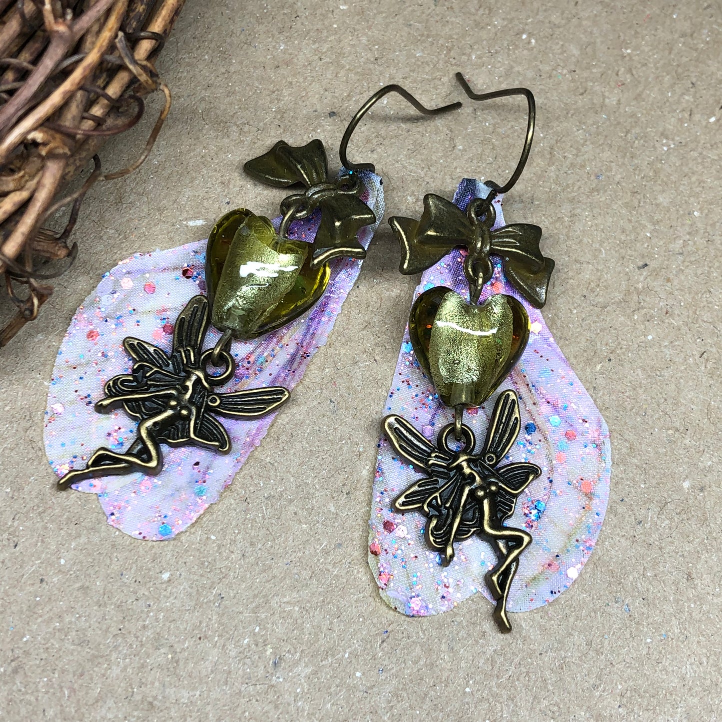 Bronze fairy wing earrings with olive hearts