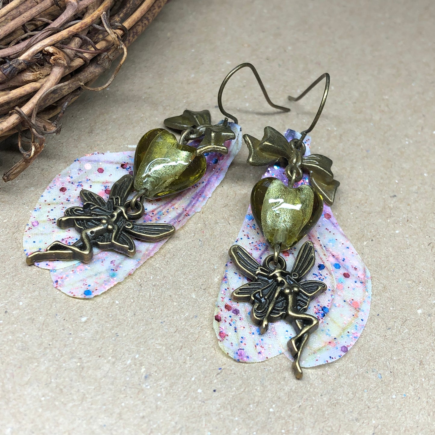 Bronze fairy wing earrings with olive hearts