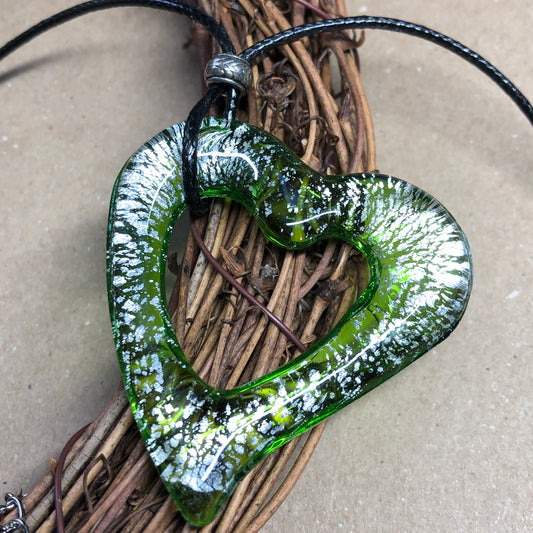 Black choker with large green heart