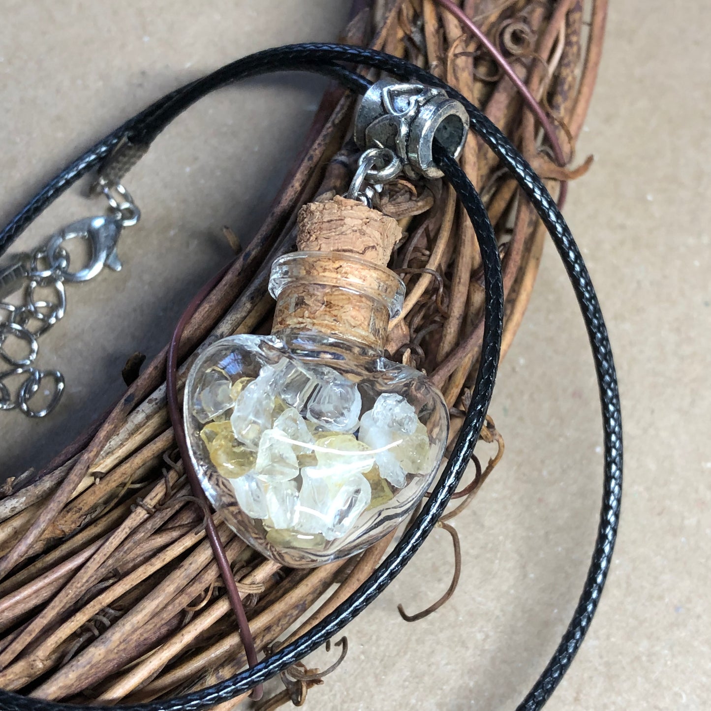 Black cord choker with Citrine chip wish bottle