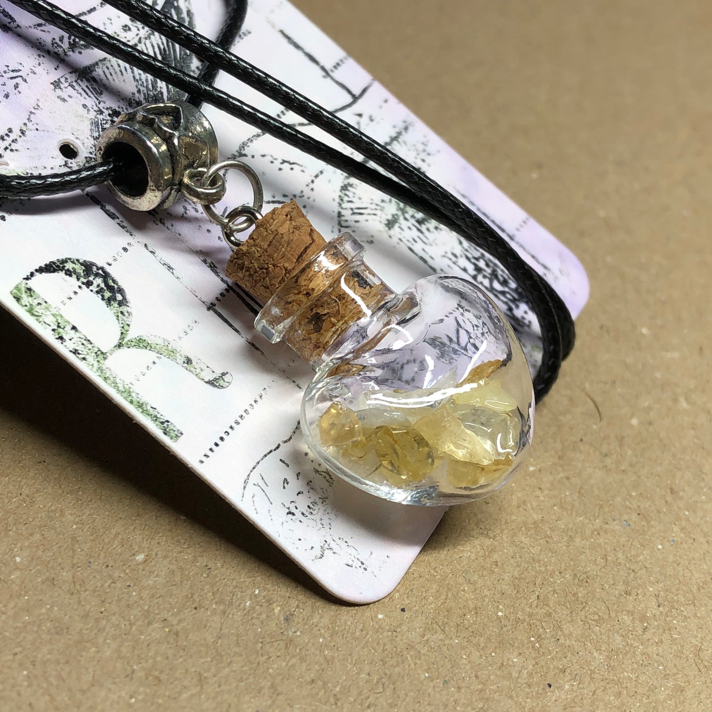 Black cord choker with Citrine chip wish bottle