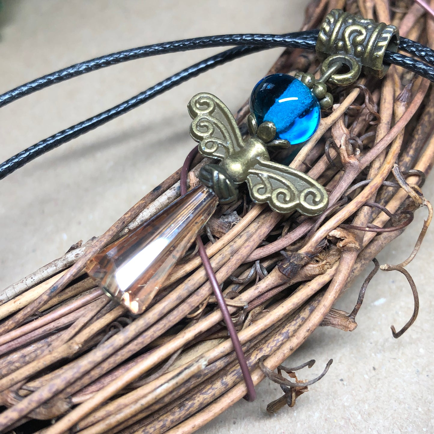 Black cord choker with crystal angel