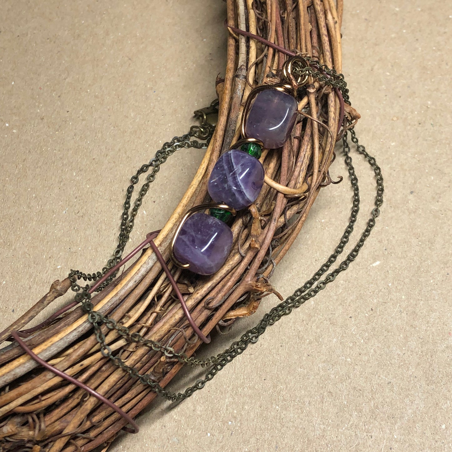 Amethyst and Emerald wire twist pendant necklace