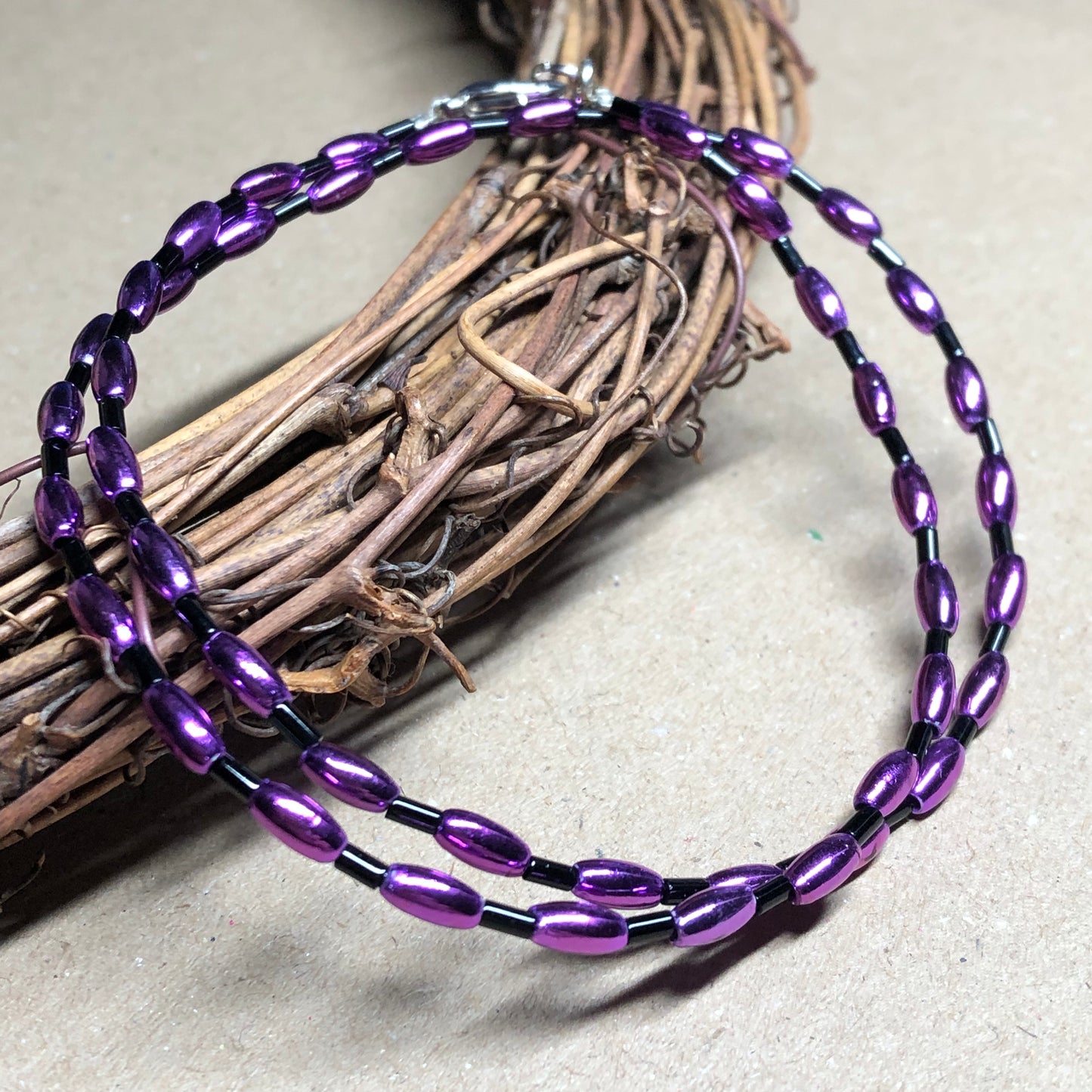 Shiny purple and black choker necklace