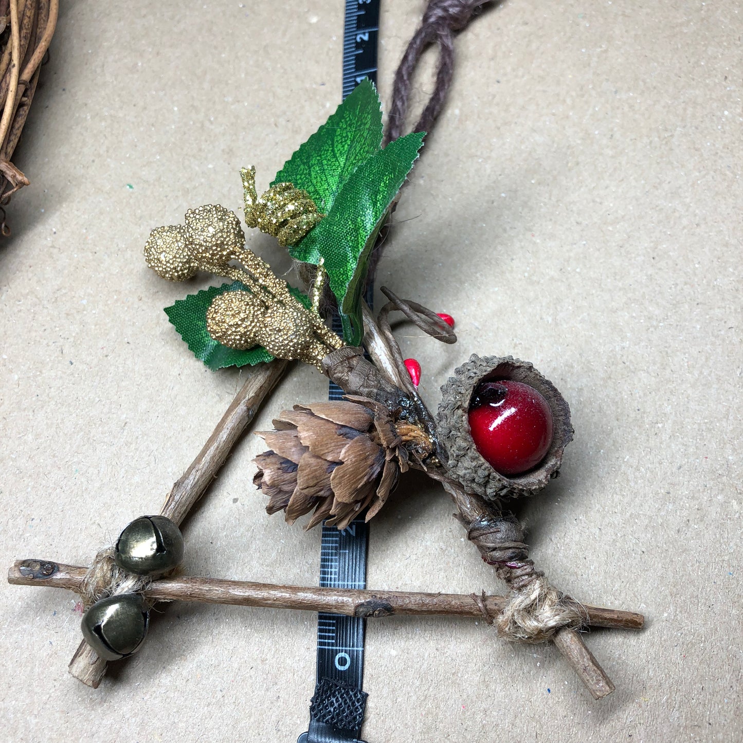 Rustic twine and twig witch bell decoration