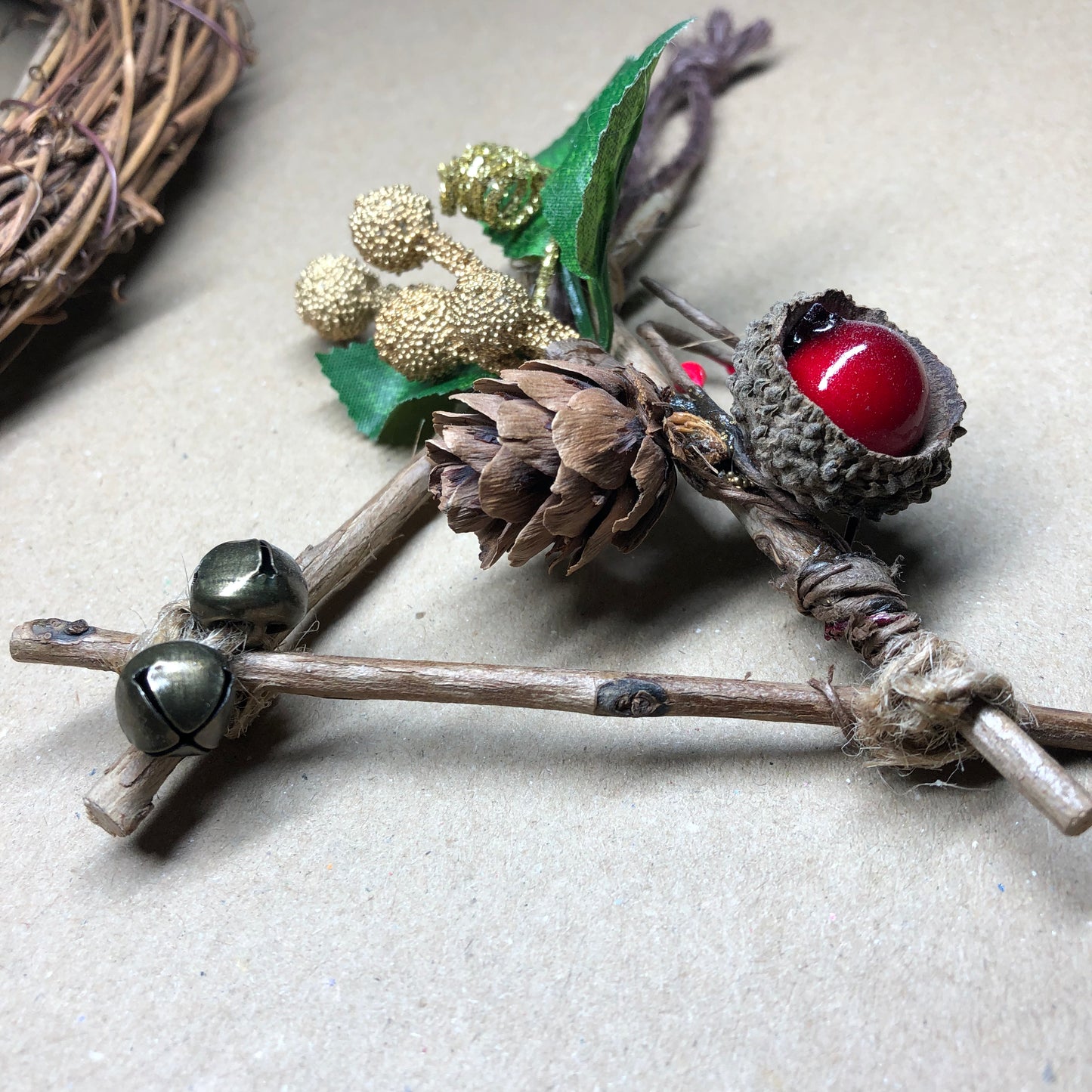 Rustic twine and twig witch bell decoration