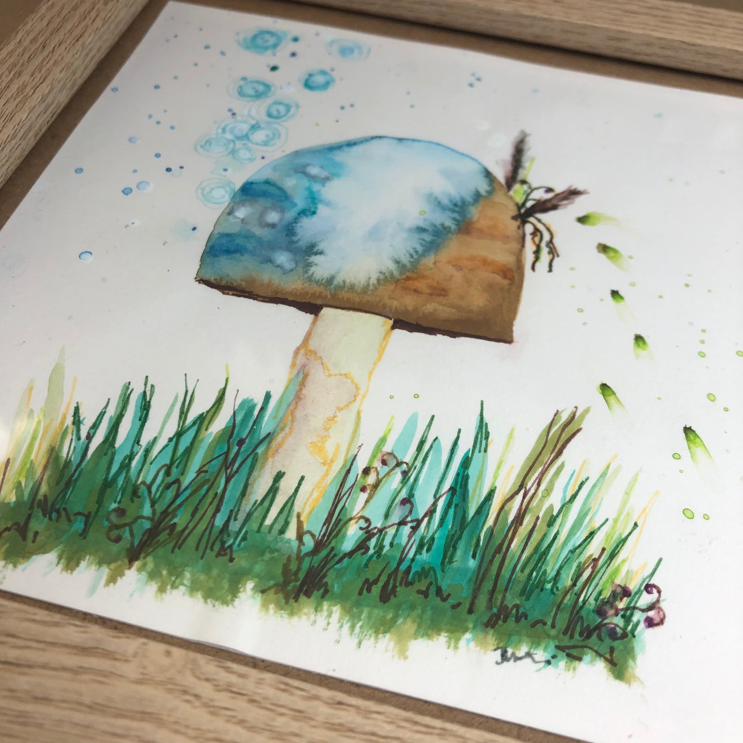 Blue and brown toadstool framed art