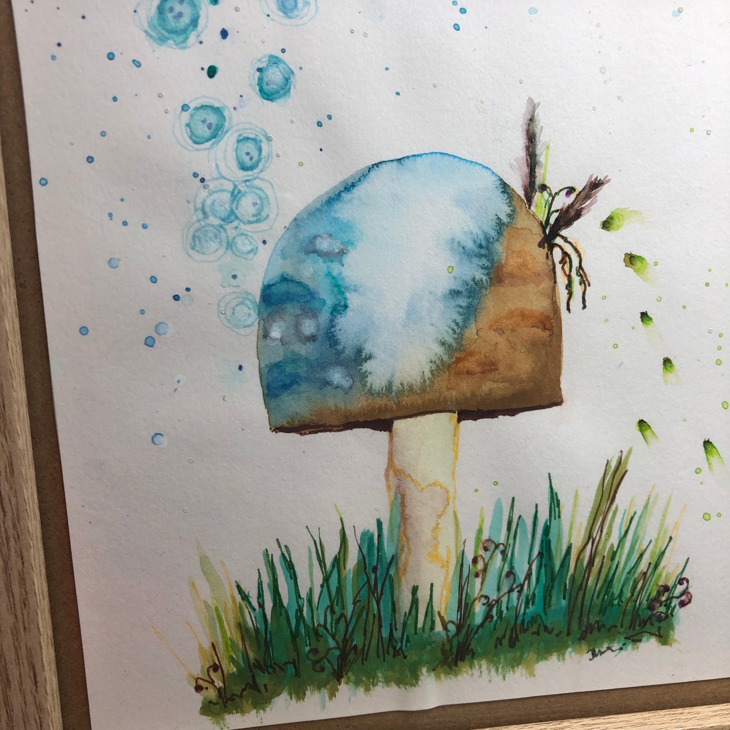 Blue and brown toadstool framed art