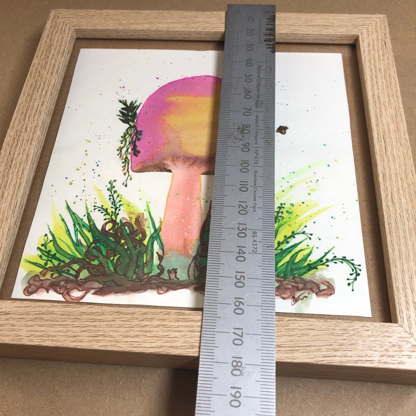 Purple and yellow toadstool framed art