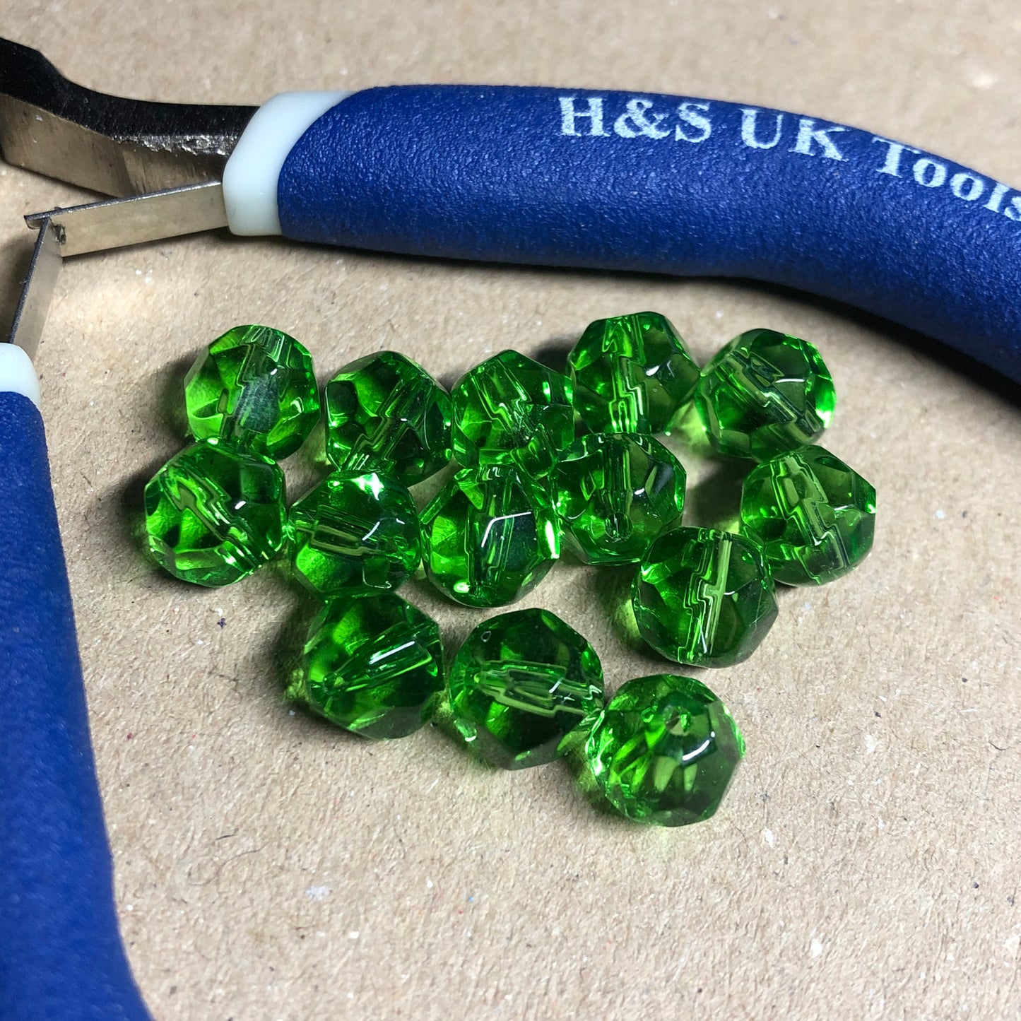 Green faceted glass beads