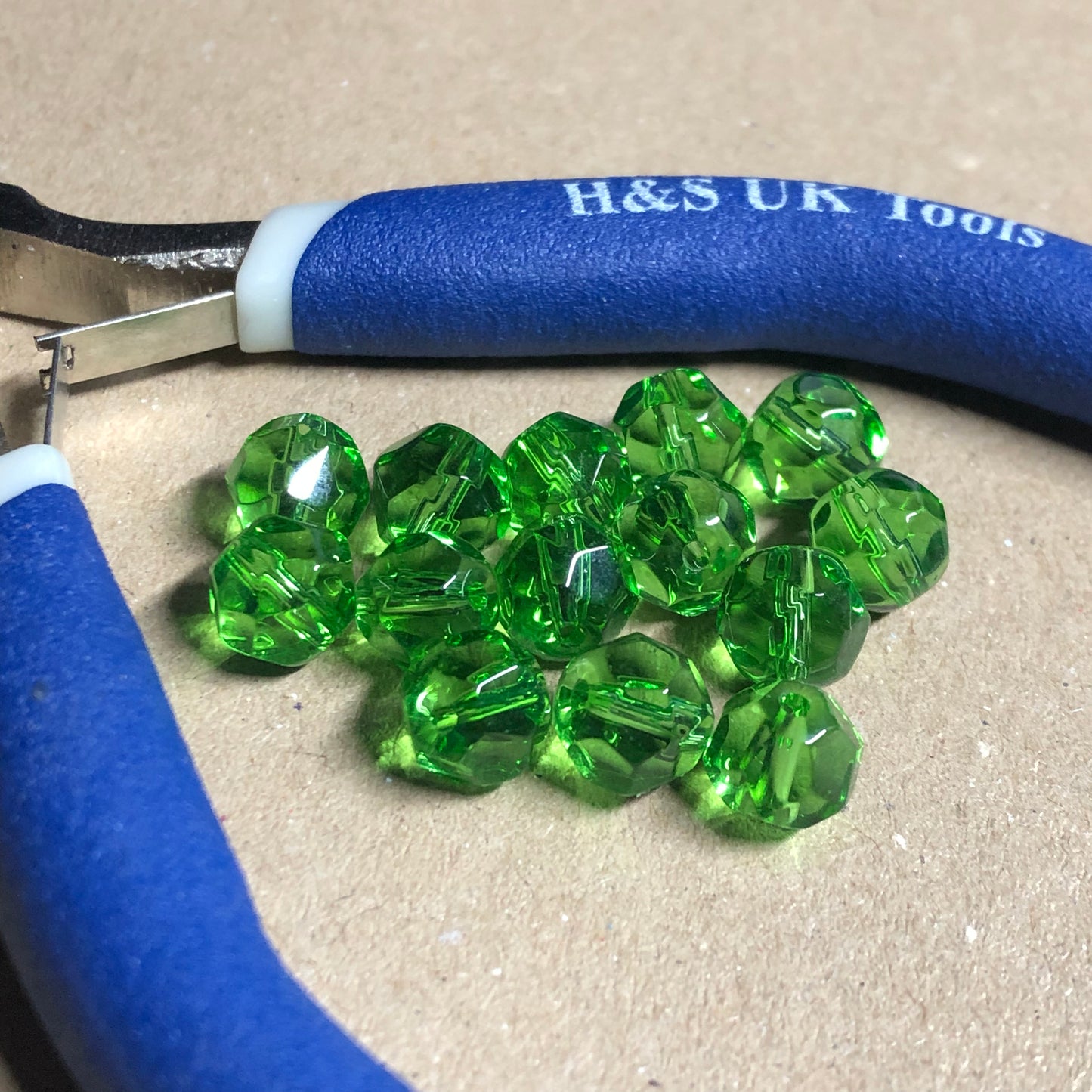 Green faceted glass beads