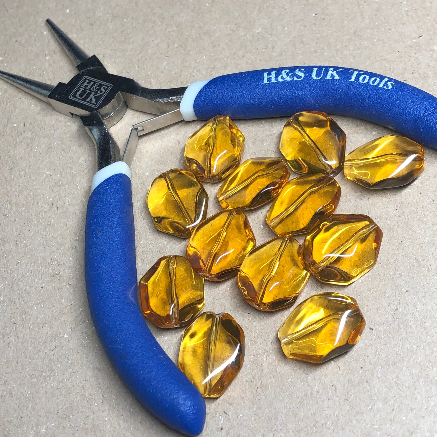 Golden syrup faceted glass beads