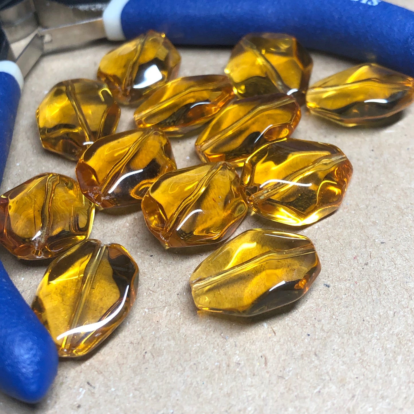 Golden syrup faceted glass beads