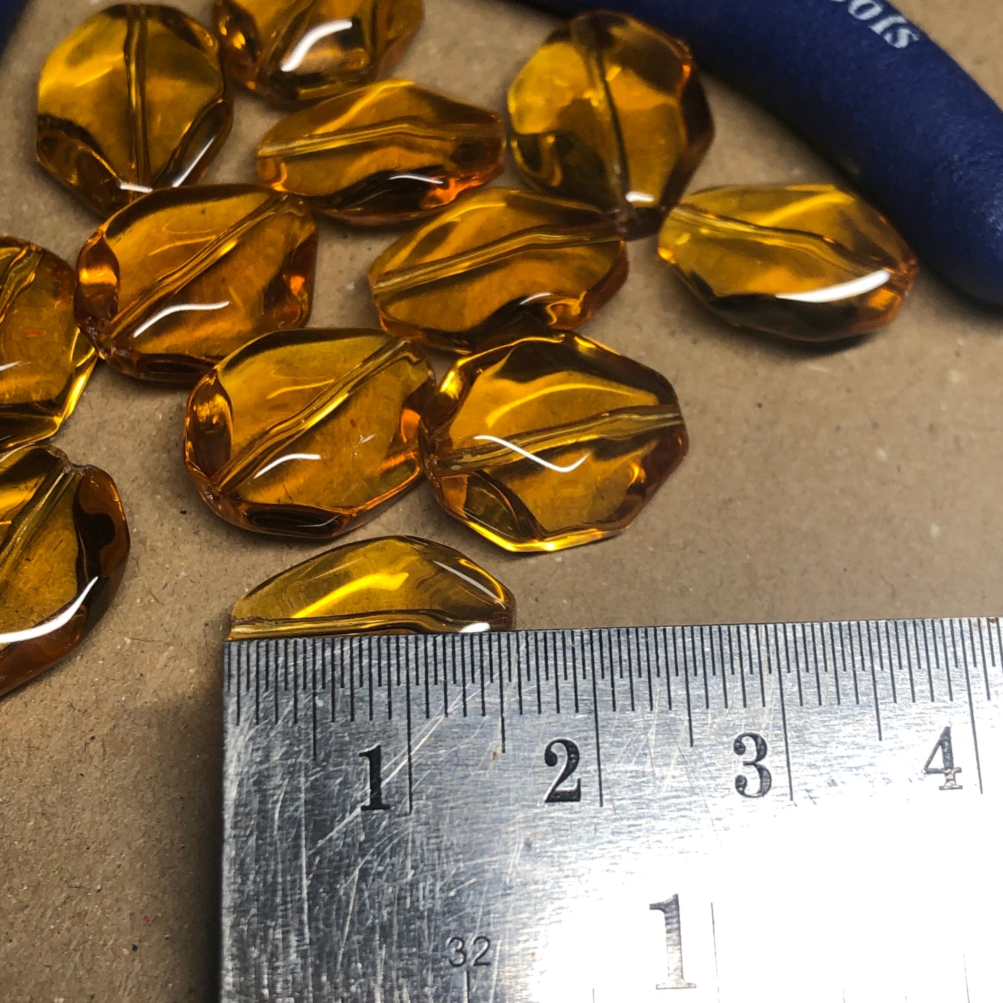 Golden syrup faceted glass beads