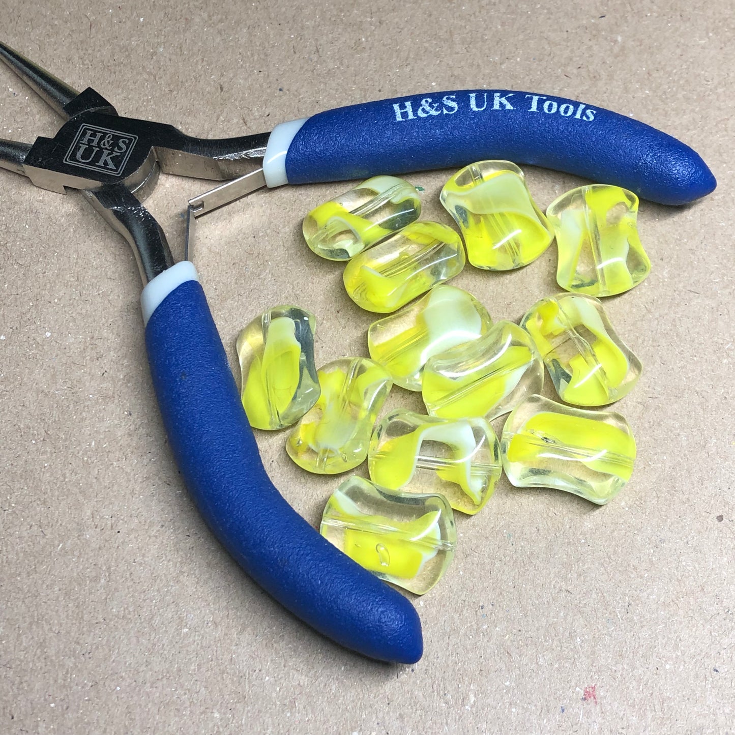 Yellow pillow shaped glass beads