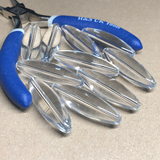 Large clear bugle glass beads