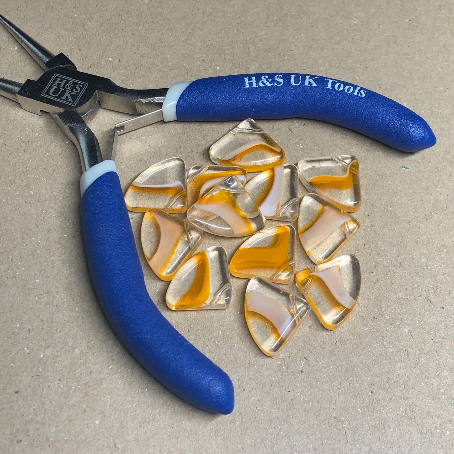 Orange fan shaped glass beads