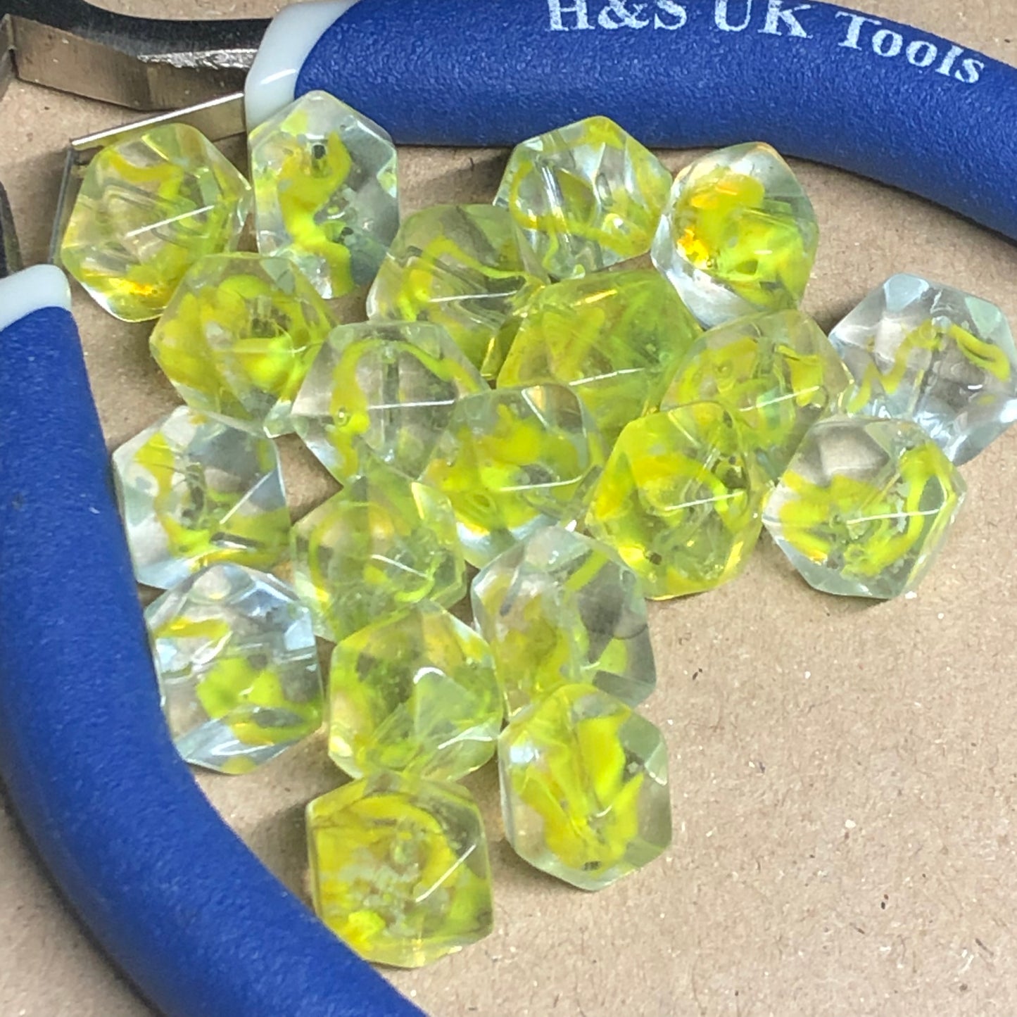 Yellow faceted cube shaped glass beads