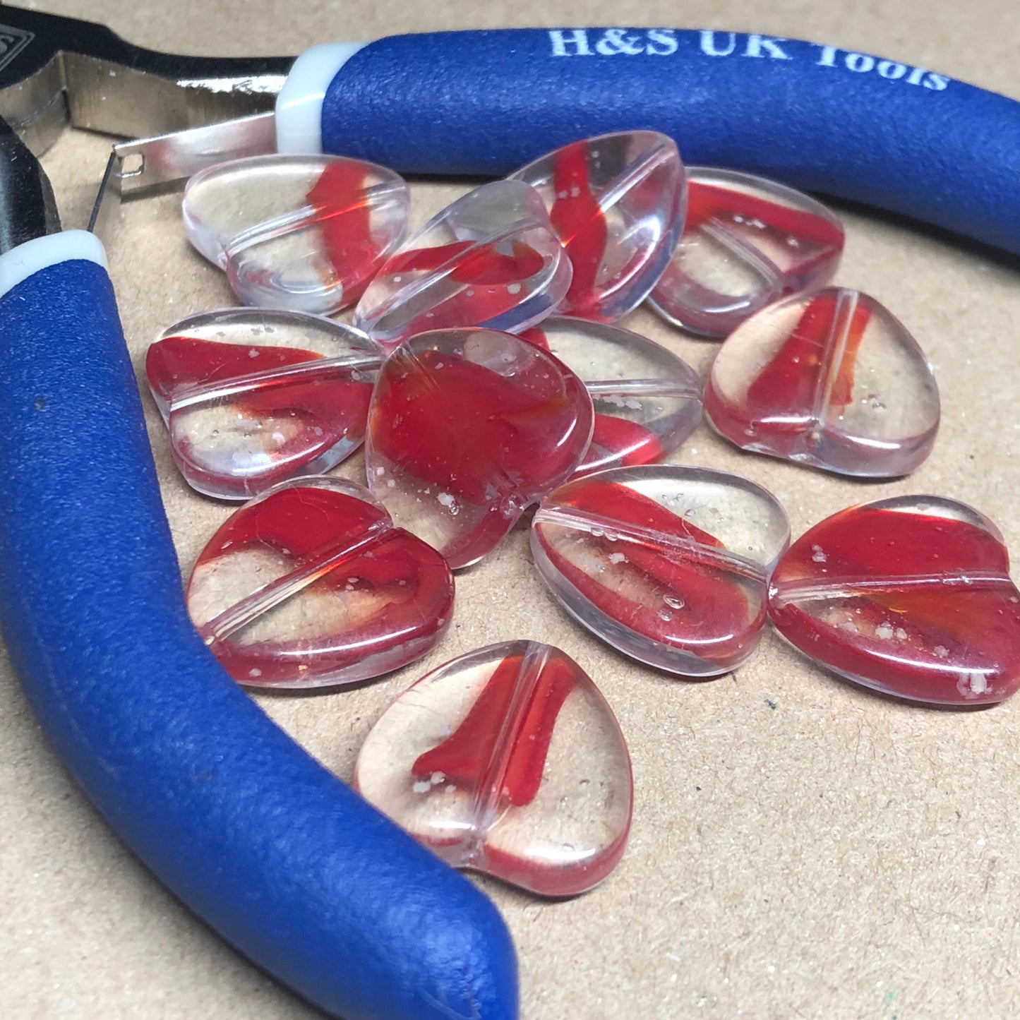 Red heart shaped glass beads