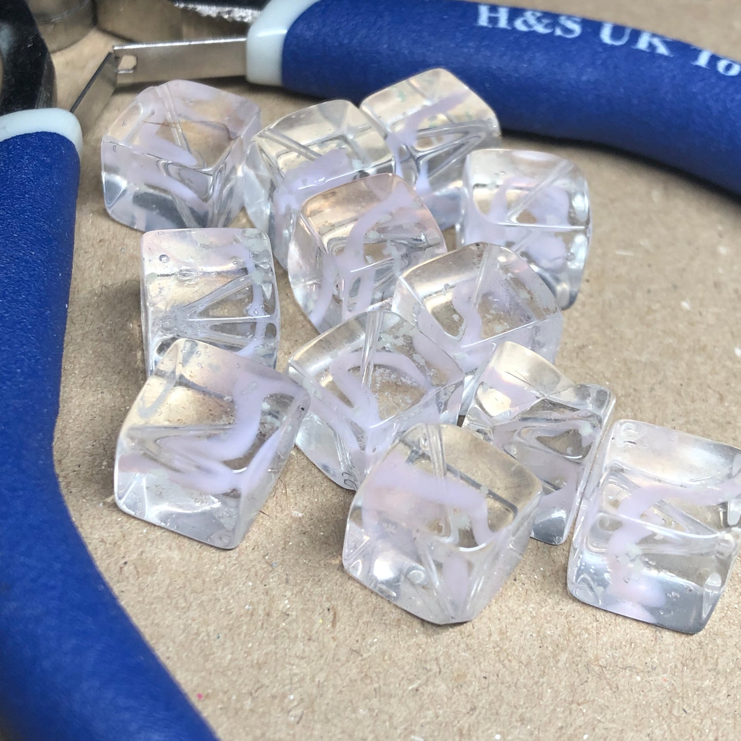 Pink streak cube glass beads