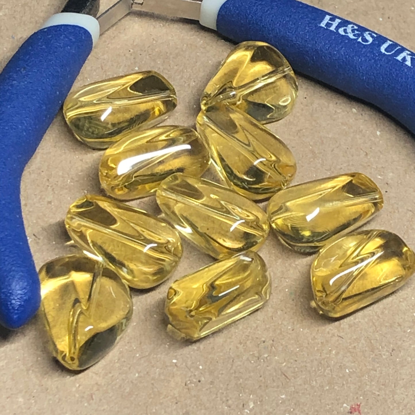 Yellow fan shaped glass beads