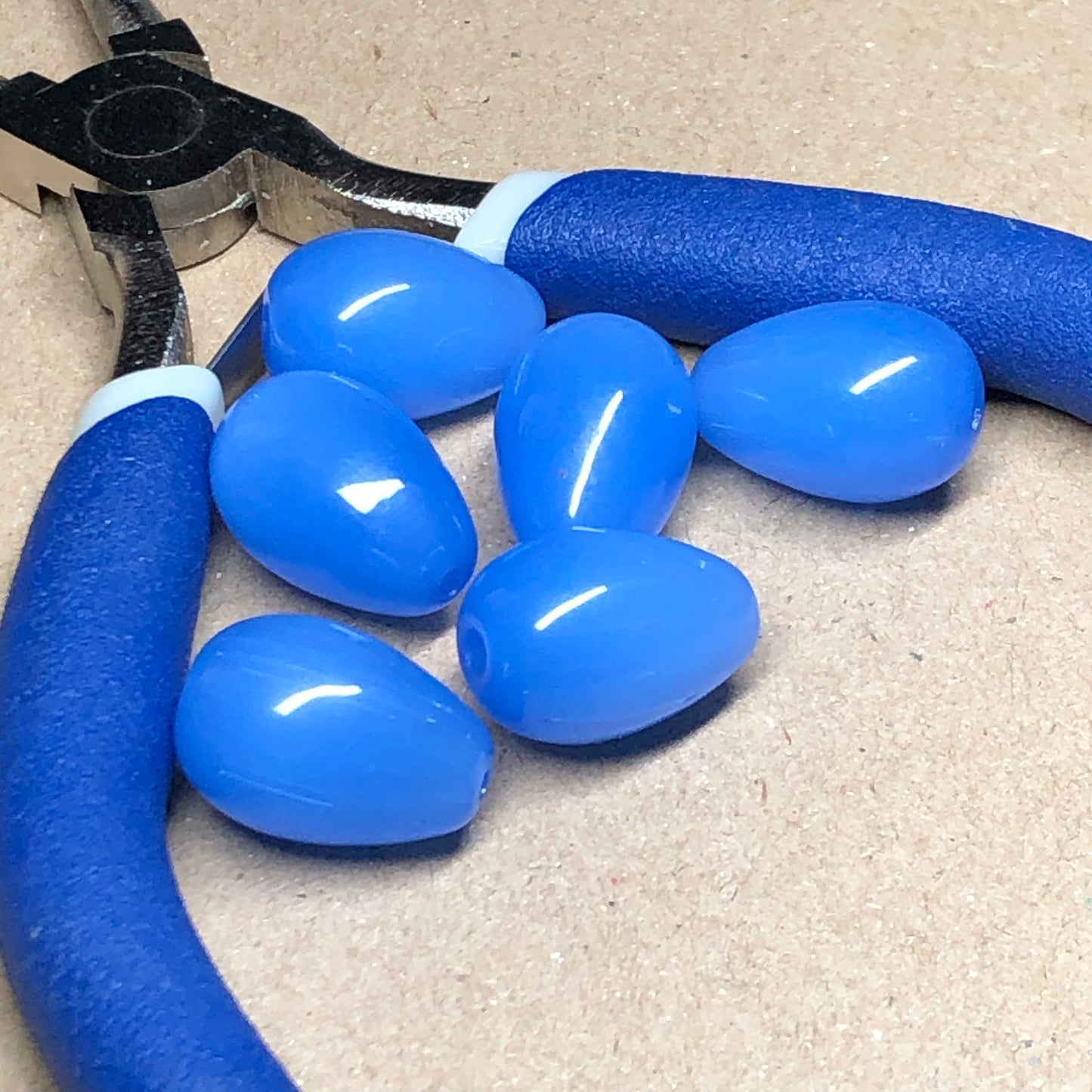 Blue opaque teardrop shaped glass beads