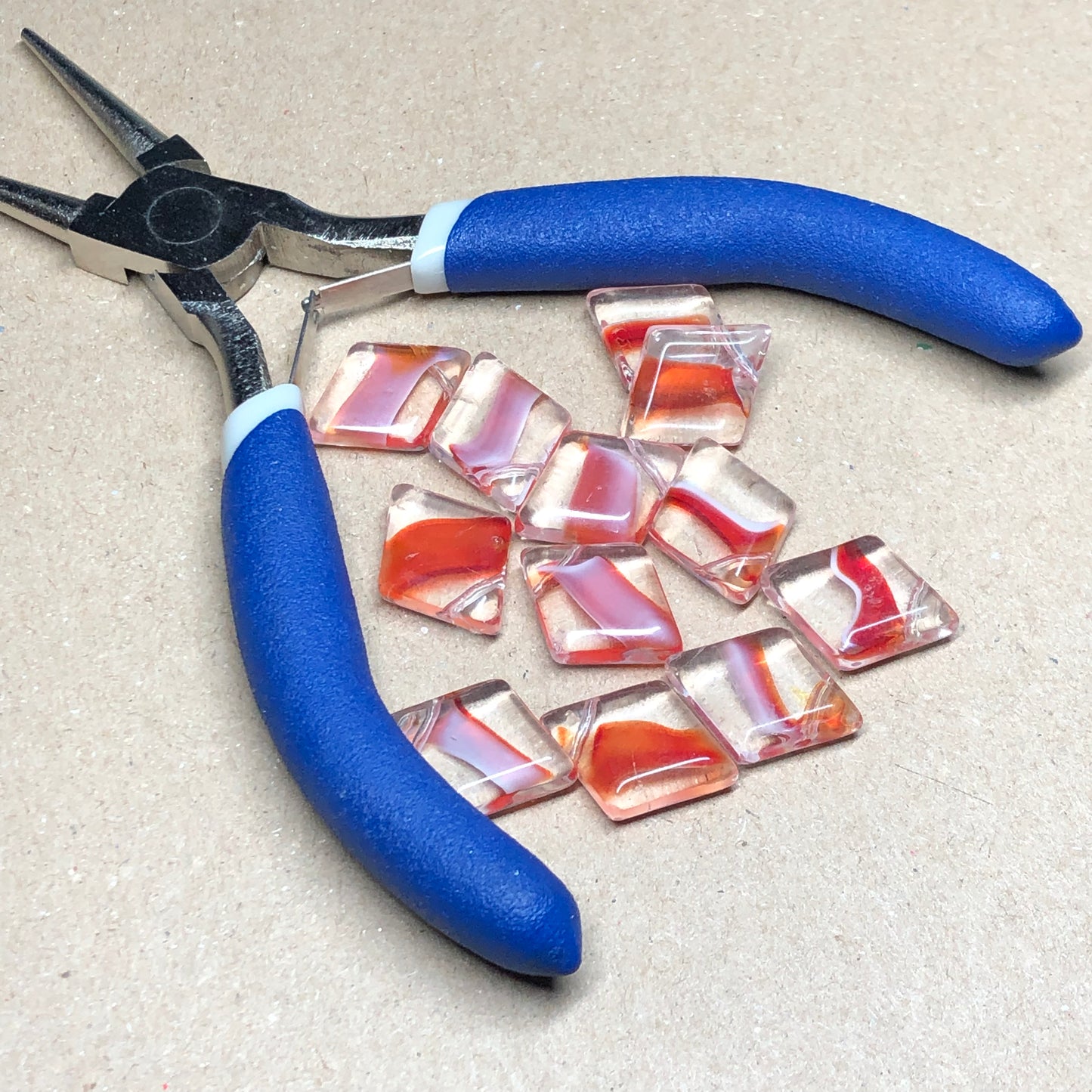 Red diamond shaped glass beads