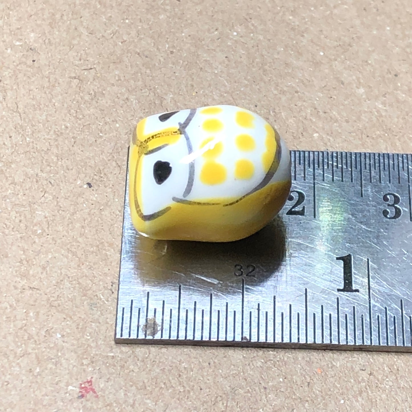 Yellow ceramic owl beads