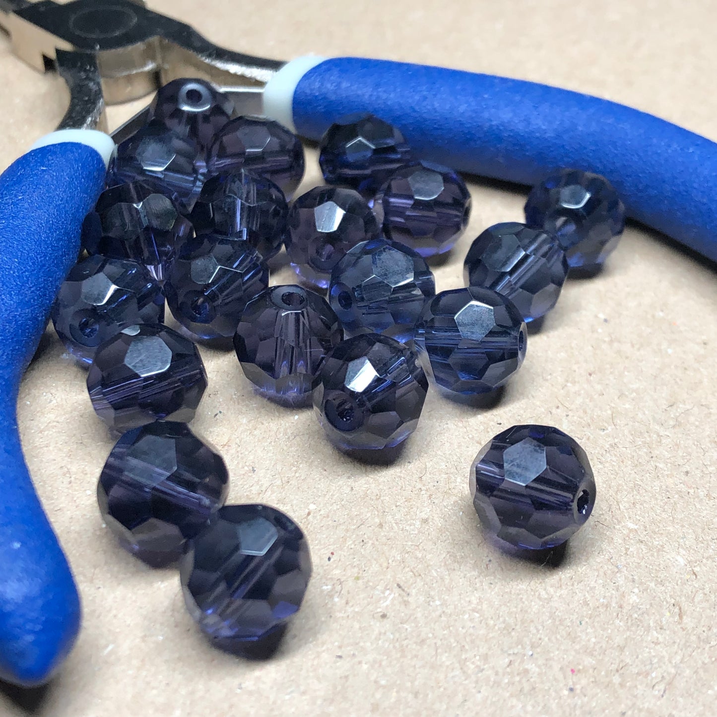 Purple faceted glass beads