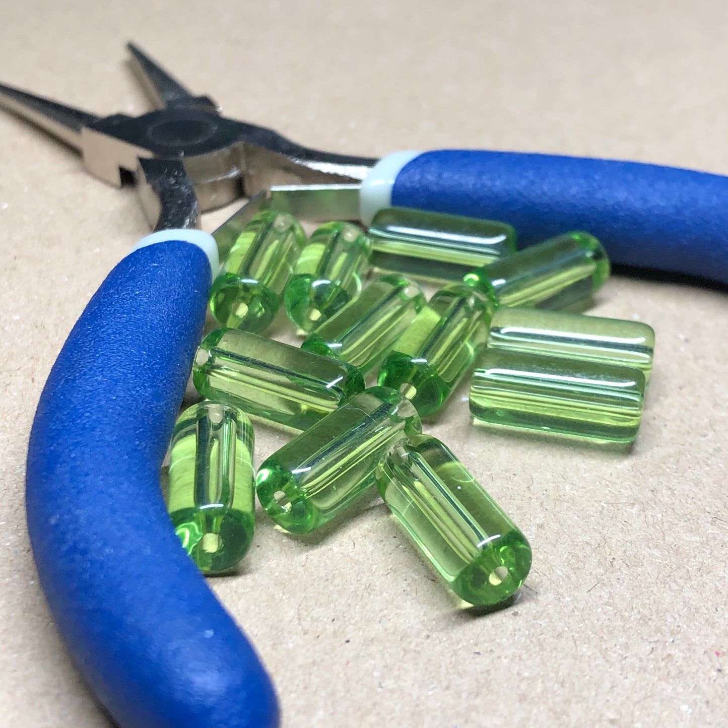 Pale green glass tube beads