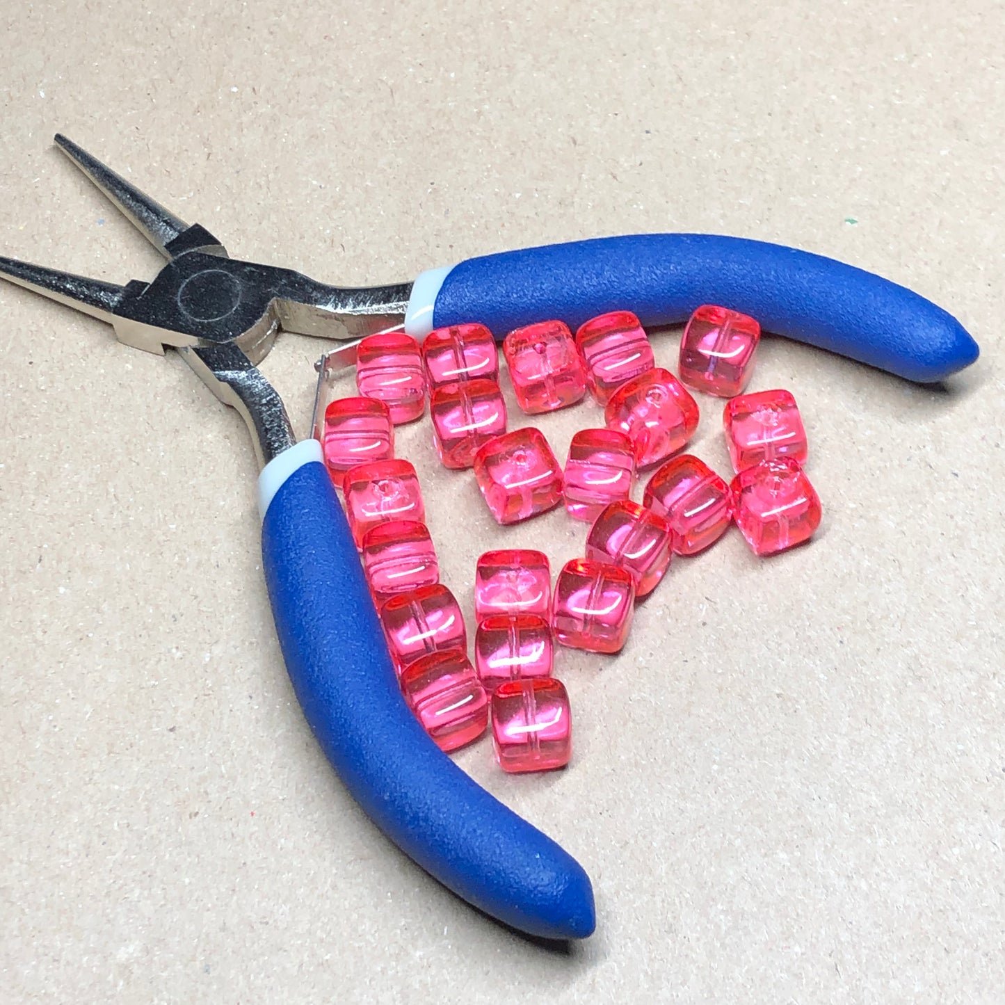 Bright pink glass cube beads