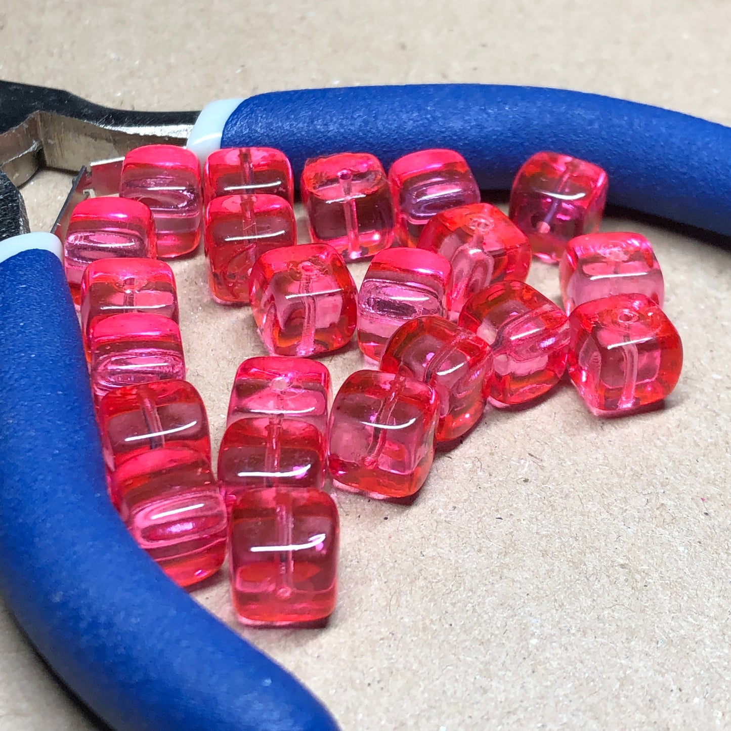 Bright pink glass cube beads