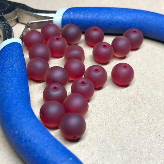 Frosted red glass beads