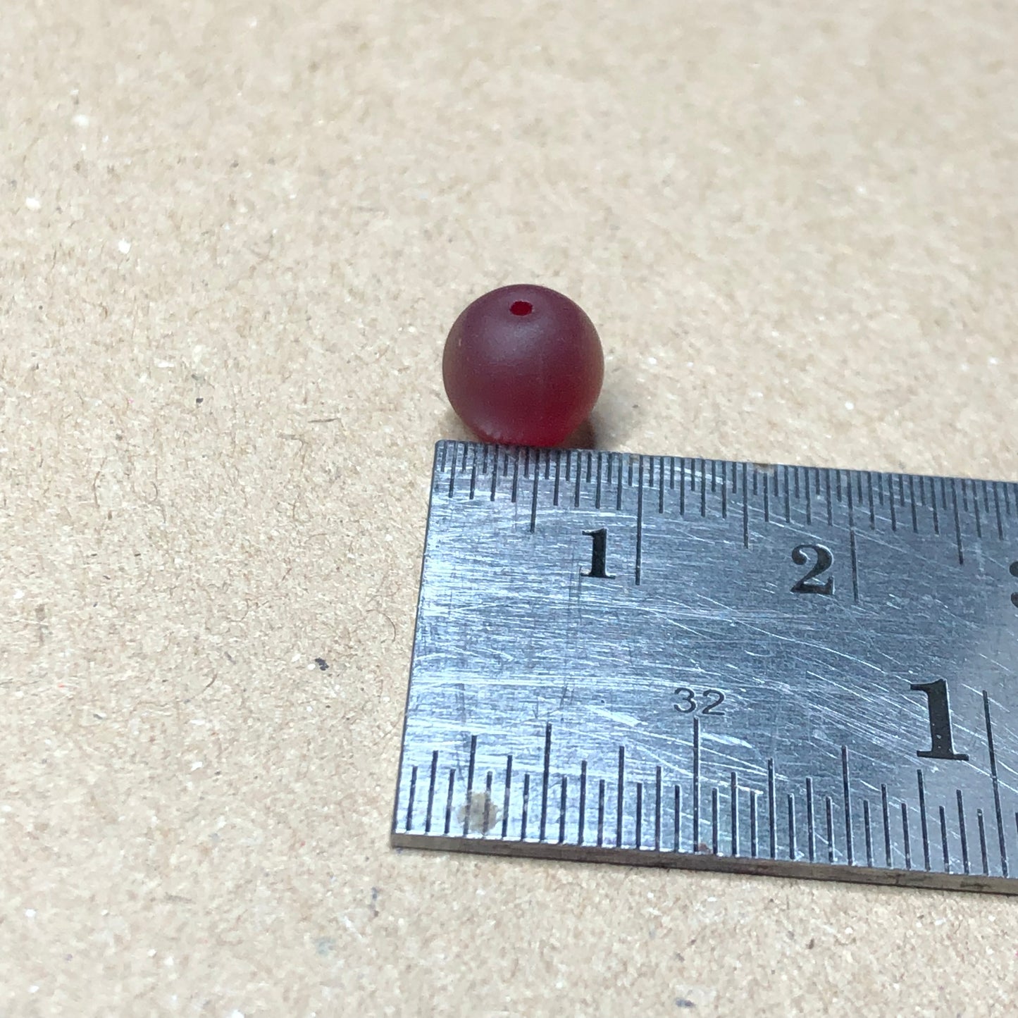 Frosted red glass beads