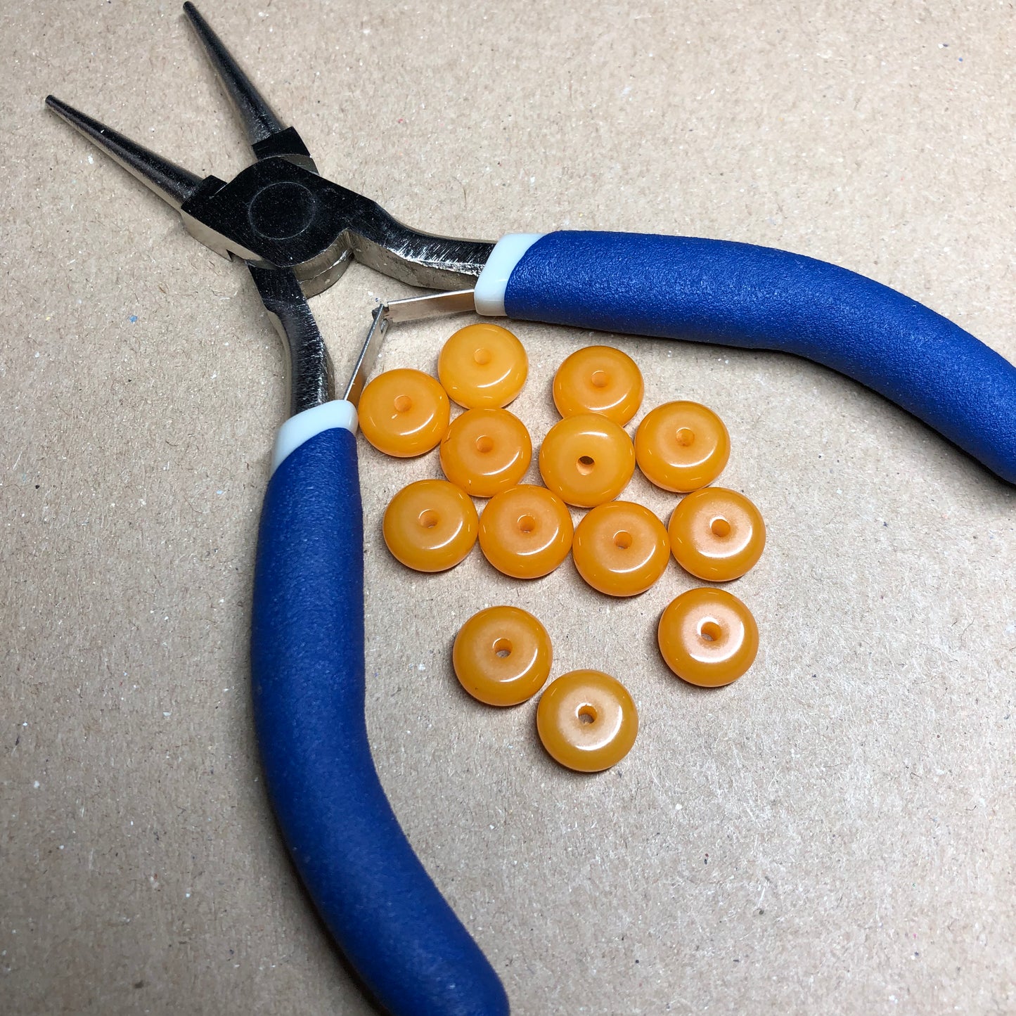 Orange glass doughnut rondelle beads