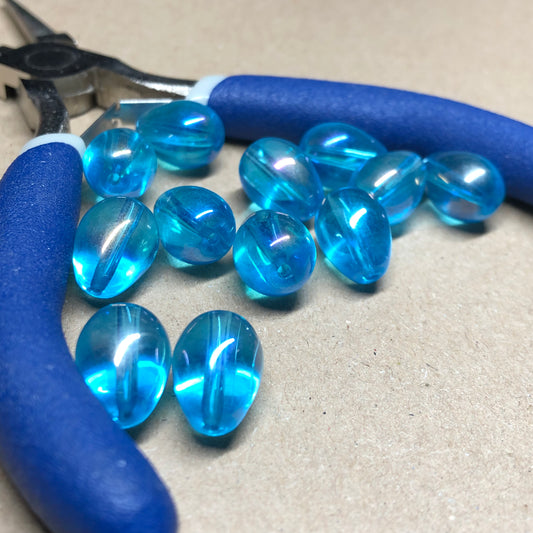 Iridescent blue teardrop shaped glass beads