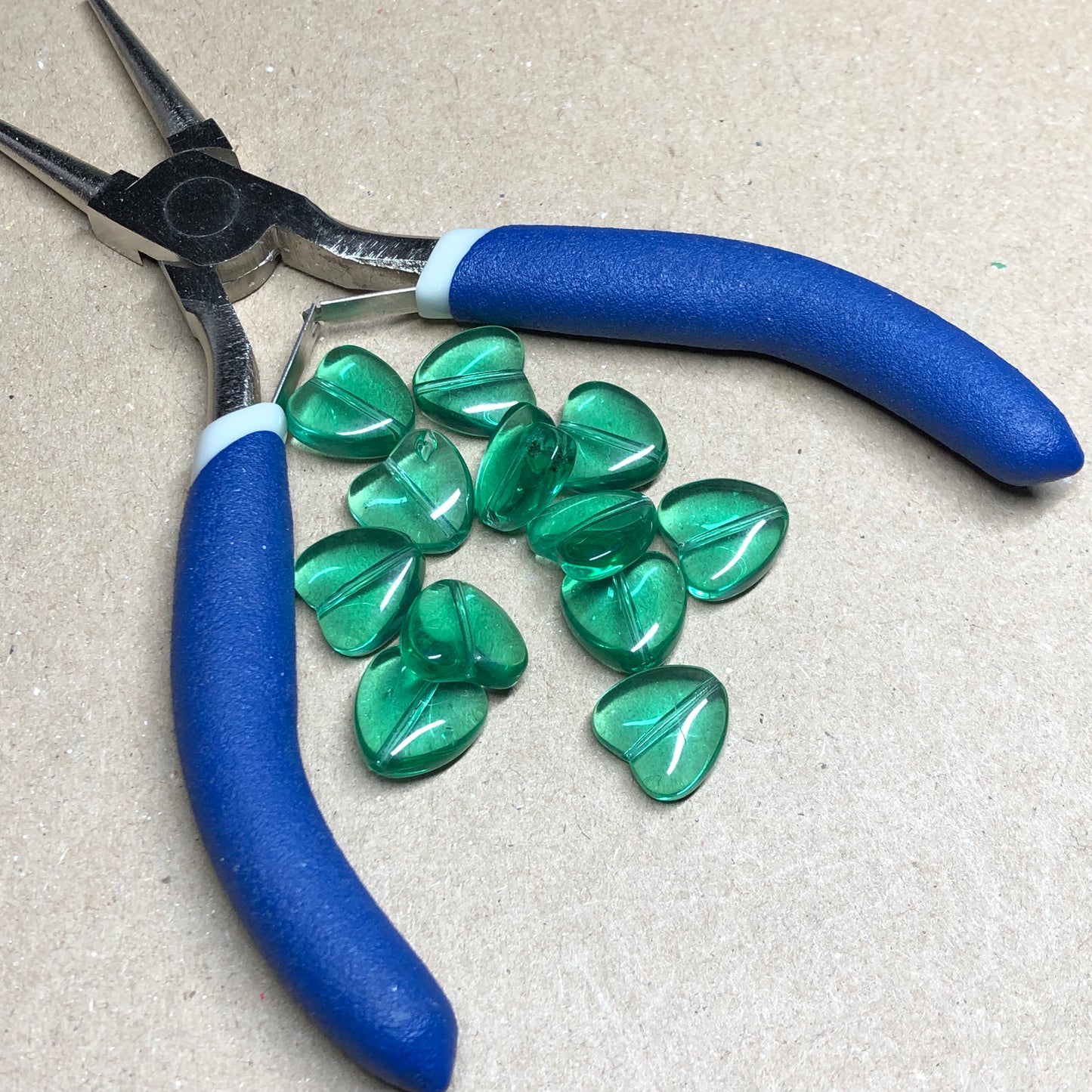 Green heart glass beads