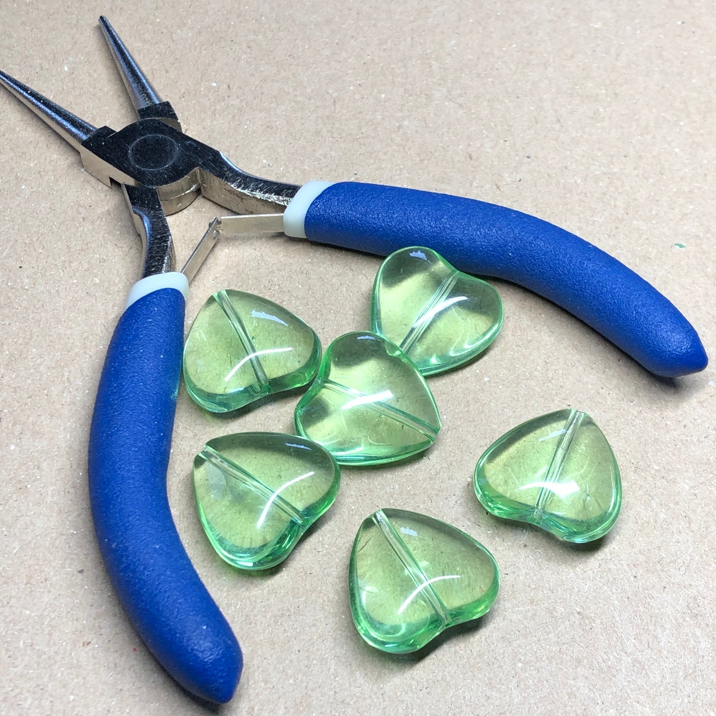 Large green glass heart beads