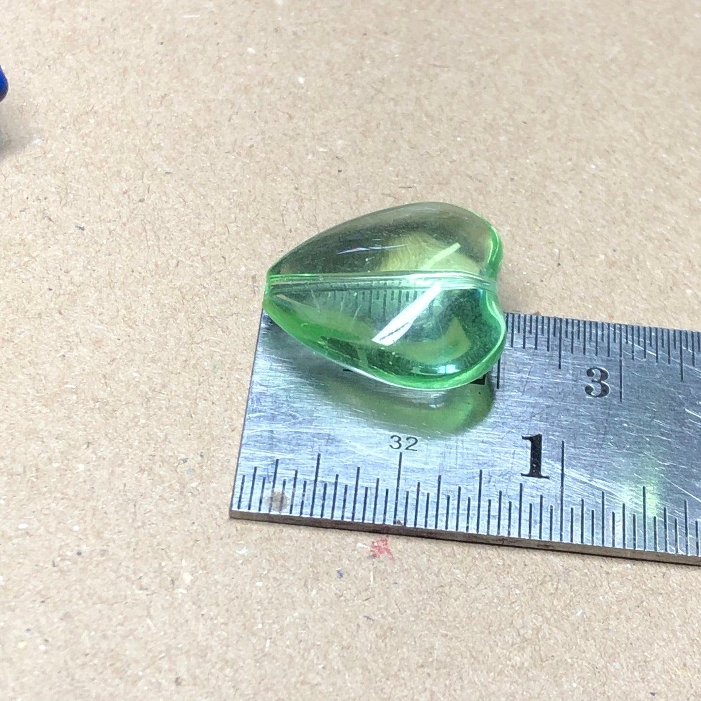 Large green glass heart beads